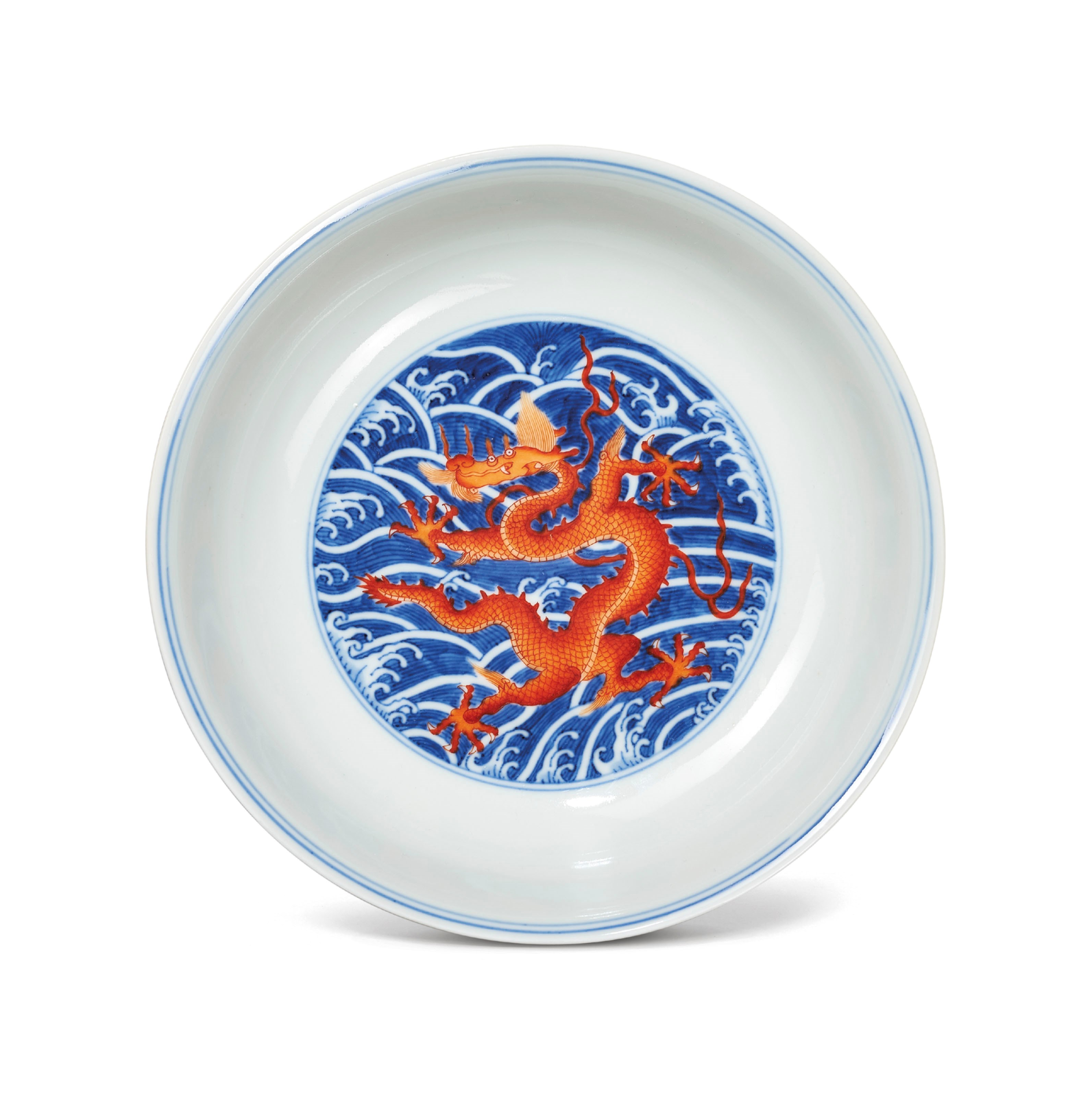 A FINE UNDERGLAZE-BLUE AND IRON-RED DECORATED ‘DRAGON’ DISH