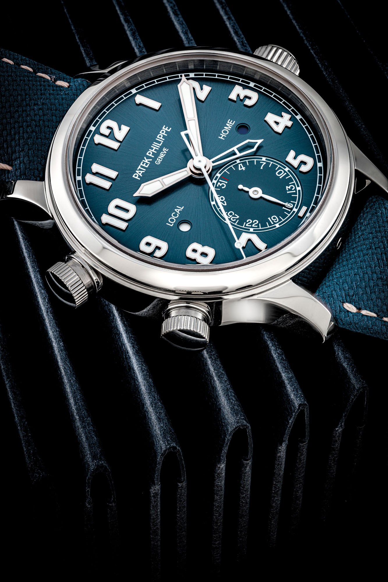 PATEK PHILIPPE. A RARE STAINLESS STEEL LIMITED EDITION AUTOMATIC DUAL TIME WRISTWATCH WITH SWEEP CENTRE SECONDS, DAY/NIGHT INDICATION AND DATE, MADE TO CELEBRATE THE SINGAPORE GRAND EXHIBITION IN 2019