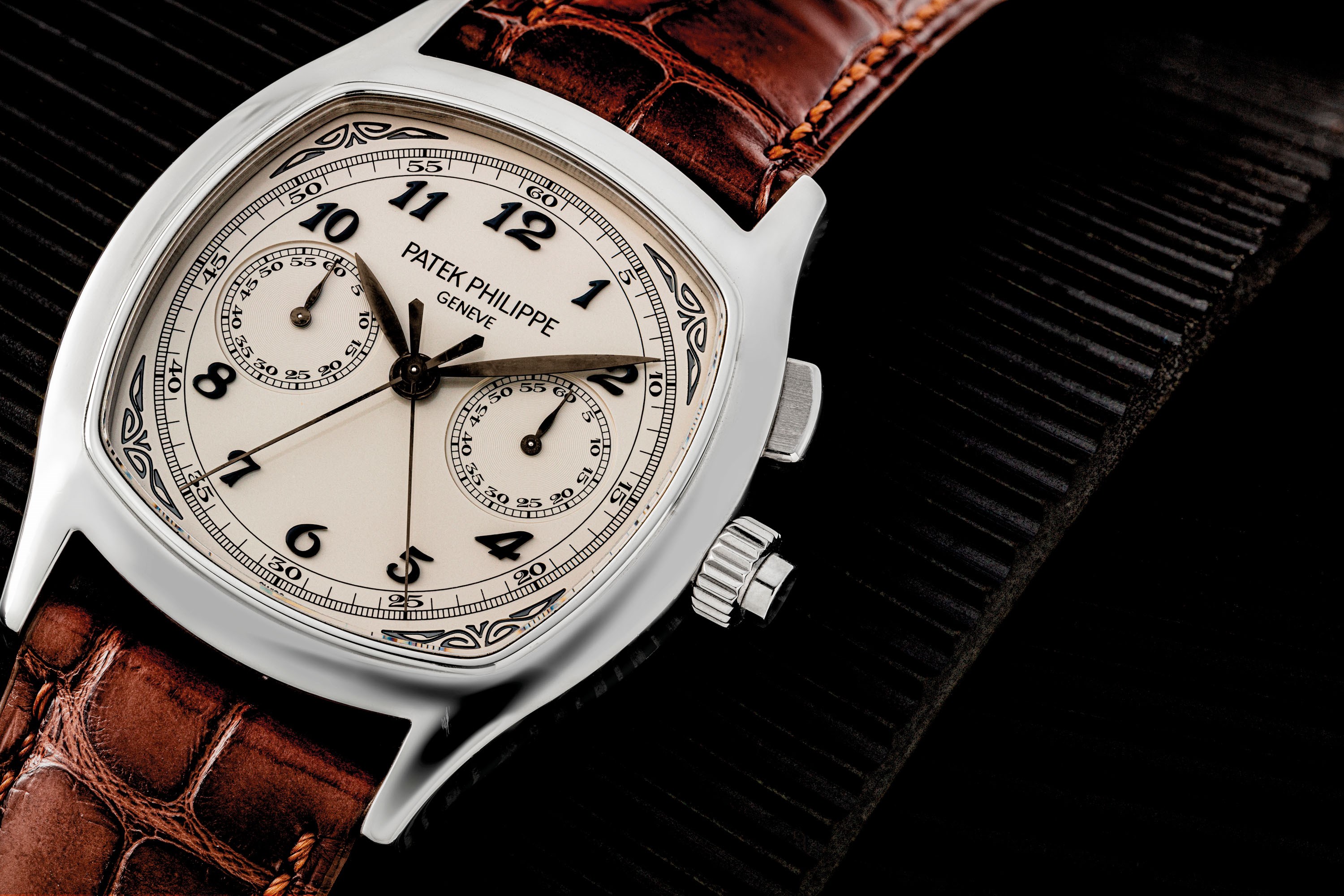 PATEK PHILIPPE. A VERY RARE STAINLESS STEEL CUSHION-SHAPED SPLIT SECONDS CHRONOGRAPH WRISTWATCH