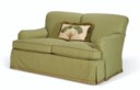 AN UPHOLSTERED TWO SEAT SOFA