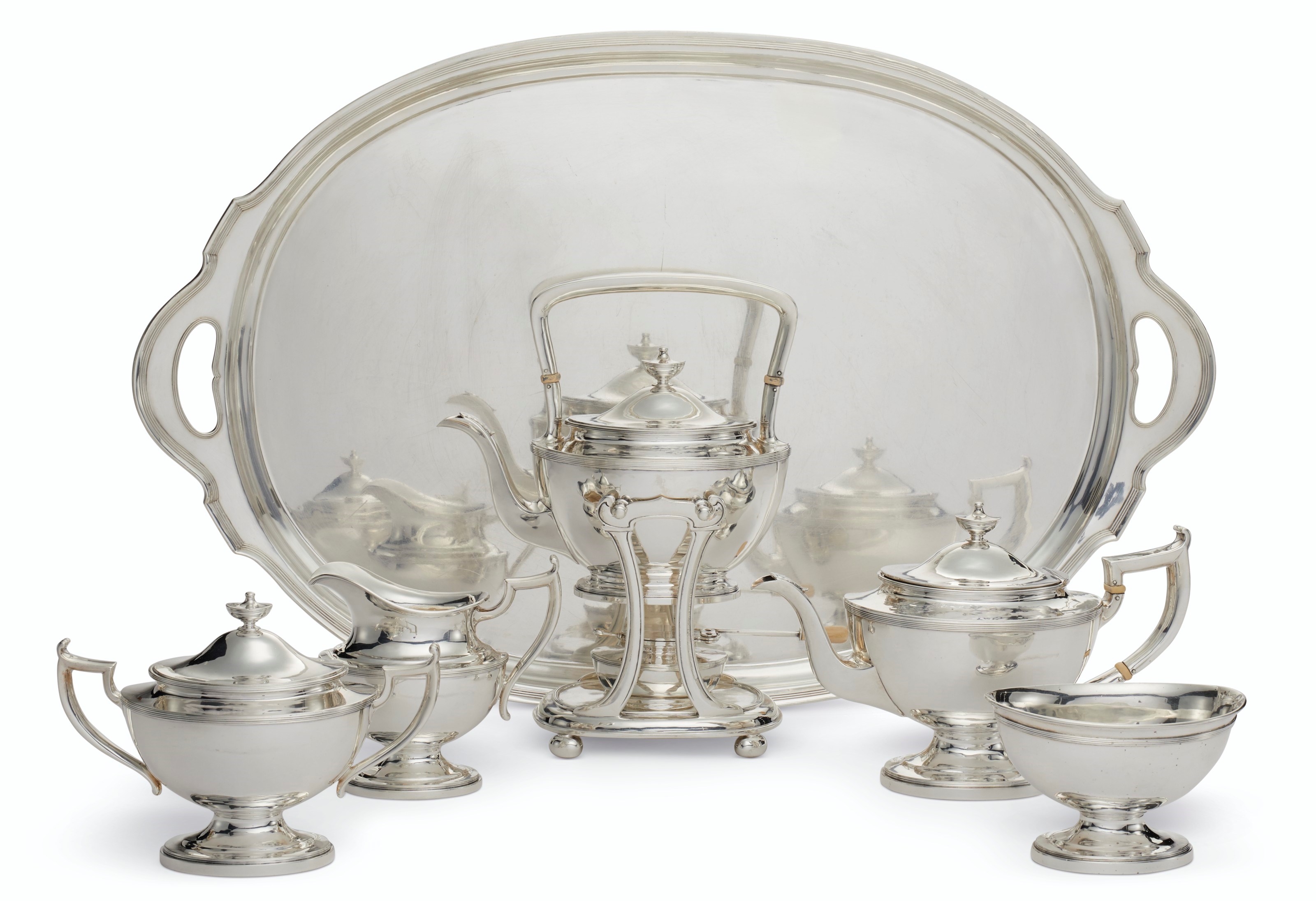 AN AMERICAN SILVER FIVE-PIECE TEA SERVICE AND MATCHING TRAY