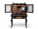 A FLEMISH GILT-METAL-MOUNTED EBONY, TORTOISESHELL AND POLYCHROME-PAINTED CABINET