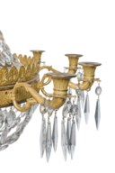 A FRENCH ORMOLU AND GLASS TWELVE-LIGHT CHANDELIER