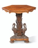 AN EARLY VICTORIAN AMBOYNA, WALNUT AND OAK CENTRE TABLE