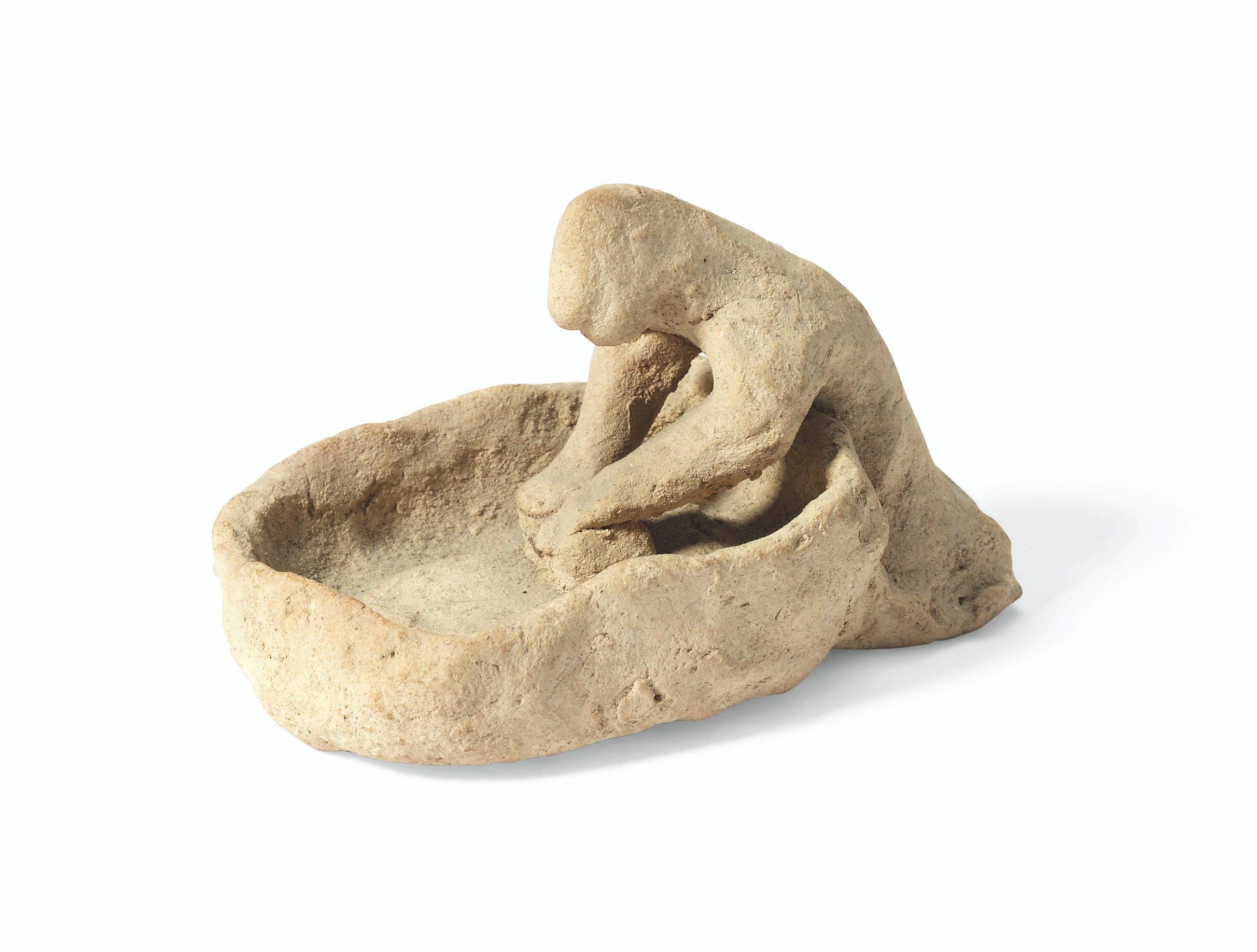 A GREEK TERRACOTTA FIGURE