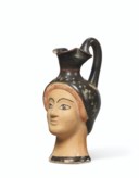 AN ATTIC POTTERY FIGURAL OINOCHOE