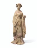 FOUR CANOSAN TERRACOTTA FEMALE FIGURES