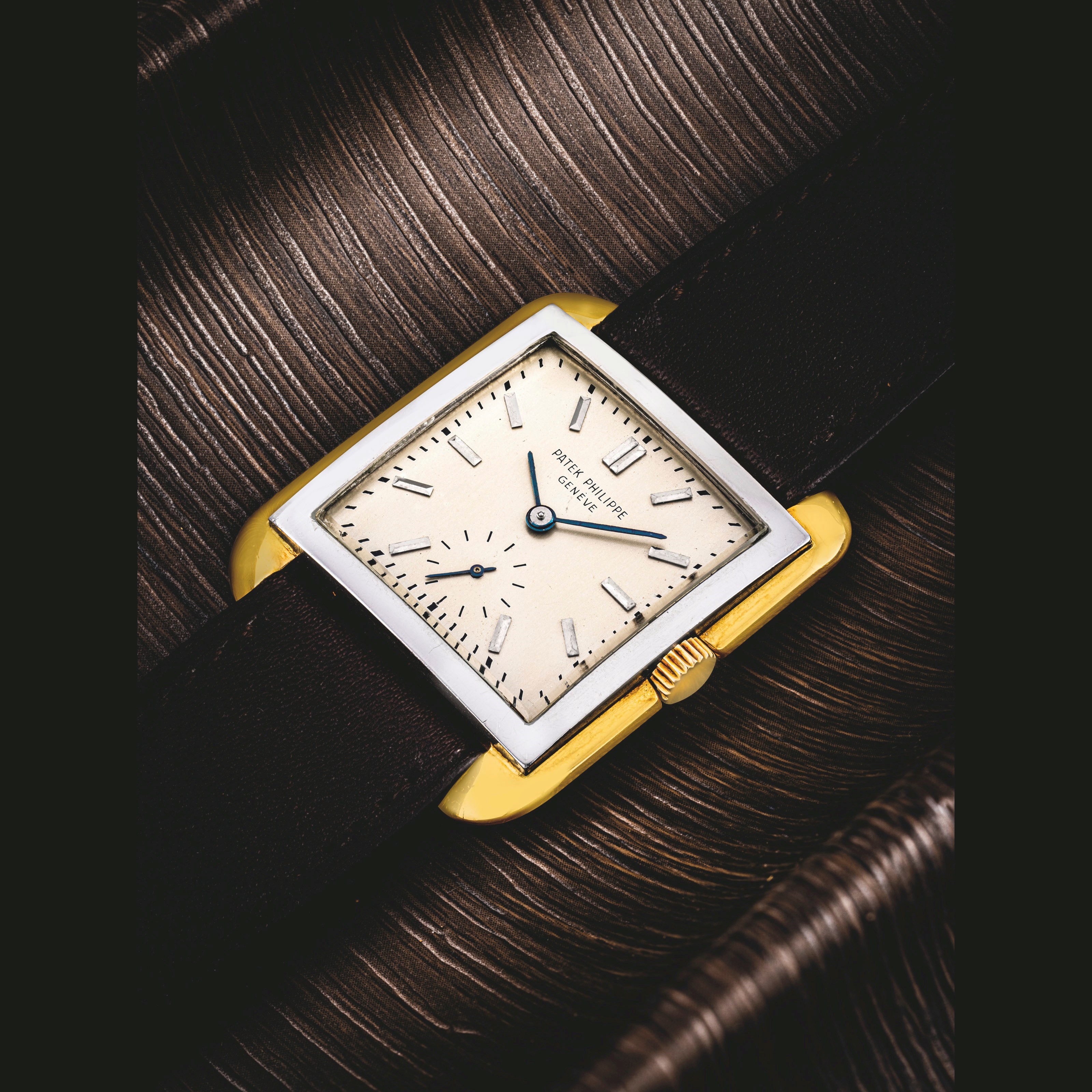 PATEK PHILIPPE, AN EXTREMELY RARE OVERSIZED PLATINUM AND 18K GOLD ULTRA-THIN GRANDE CIOCCOLATONE WRISTWATCH