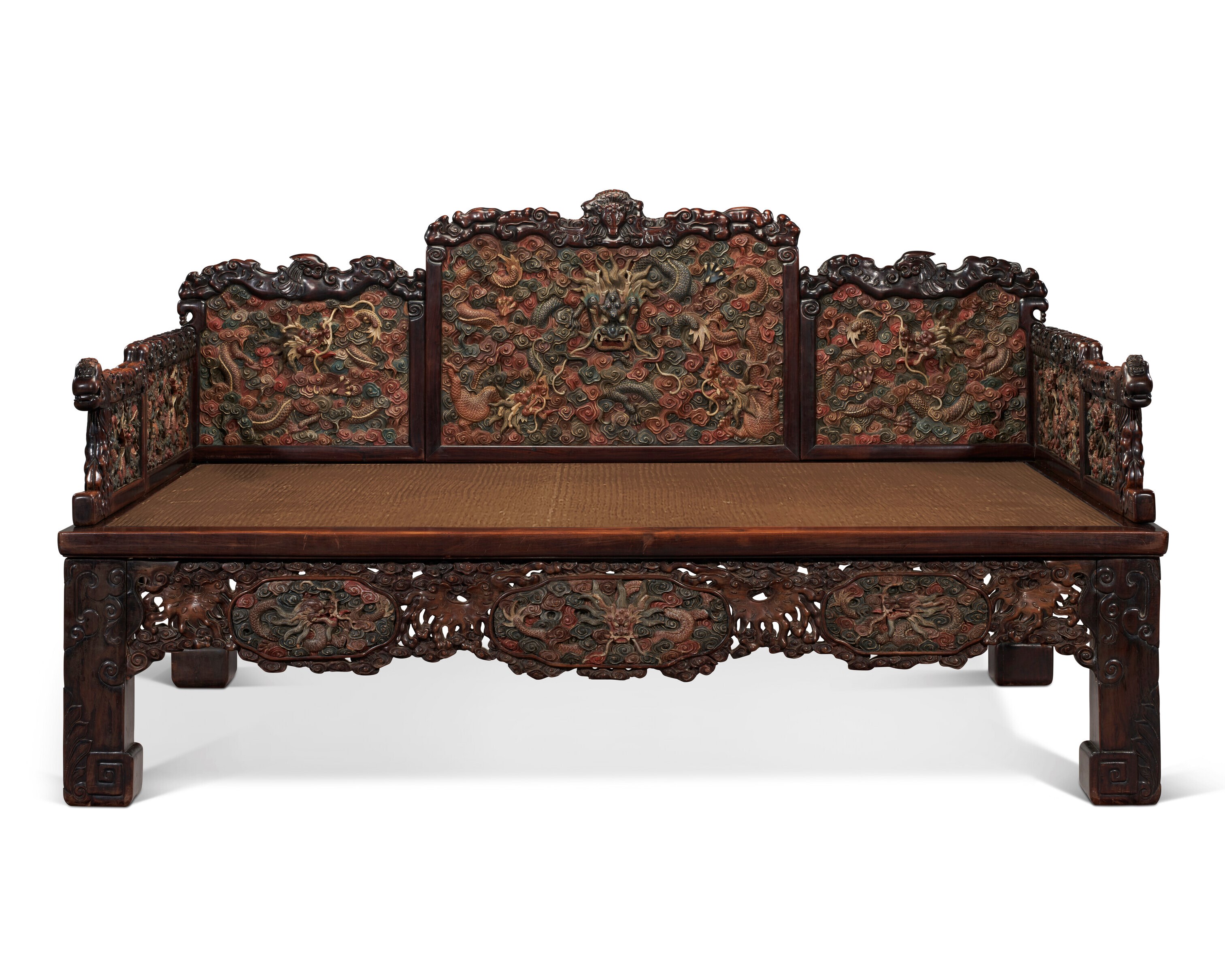 AN IMPRESSIVE POLYCHROME, GILT-DECORATED AND CARVED HONGMU LUOHAN BED