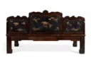 AN IMPRESSIVE POLYCHROME, GILT-DECORATED AND CARVED HONGMU LUOHAN BED