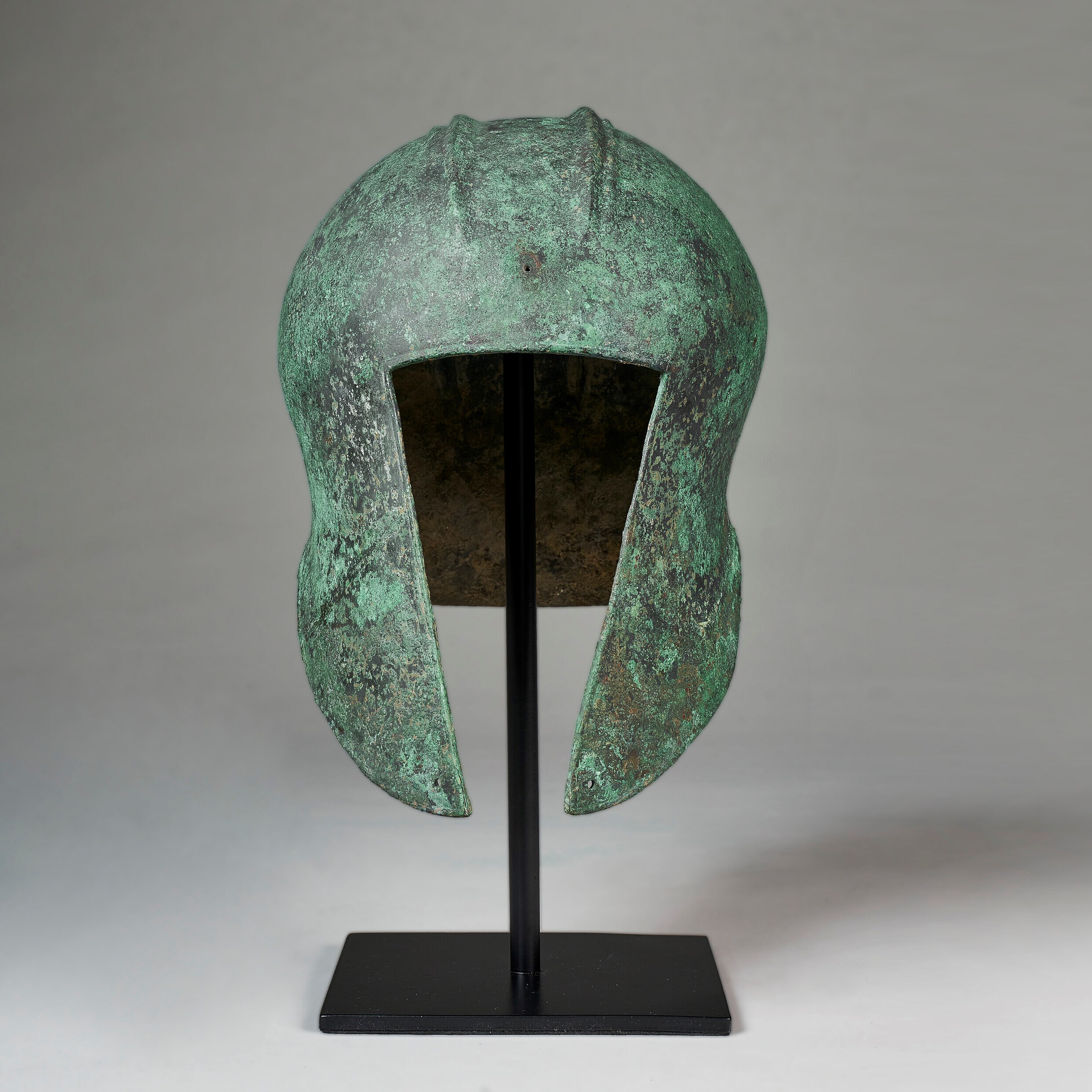 A GREEK BRONZE ILLYRIAN HELMET