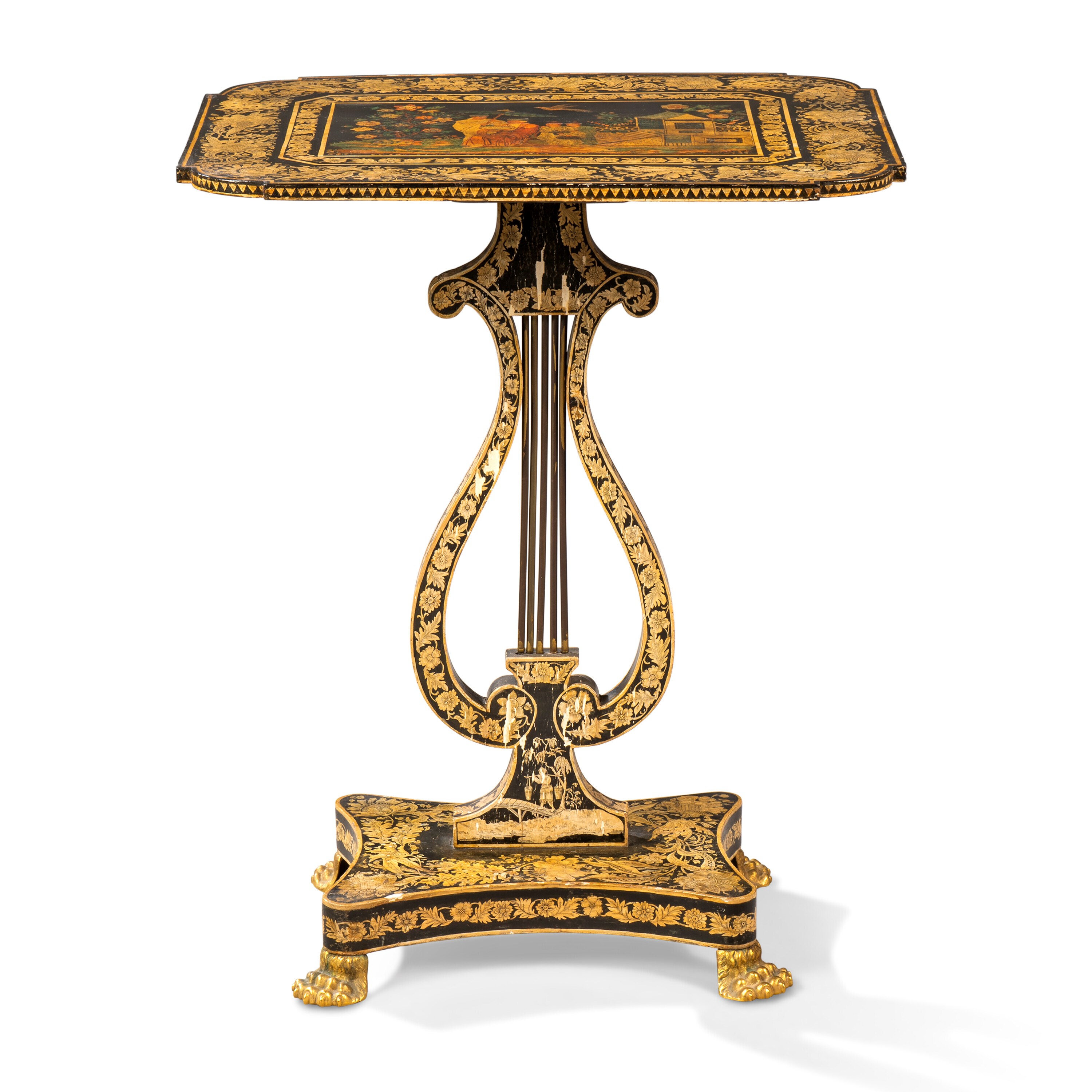 A REGENCY EBONISED AND PENWORK OCCASIONAL TABLE