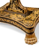 A REGENCY EBONISED AND PENWORK OCCASIONAL TABLE