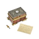 A GEORGE III SILVER AND ORMOLU-MOUNTED AGATE CASKET WITH TIMEPIECE