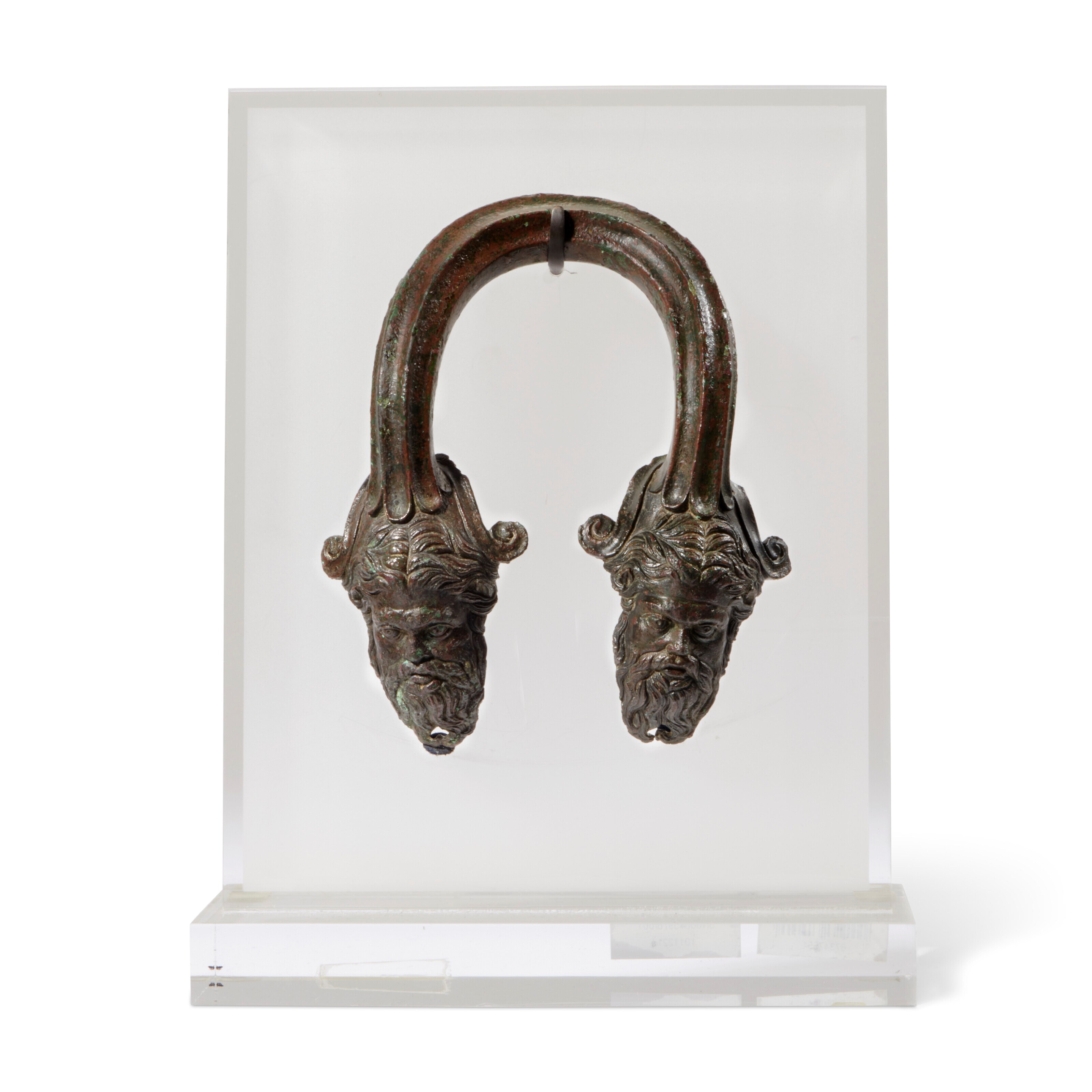 A GREEK BRONZE VESSEL HANDLE