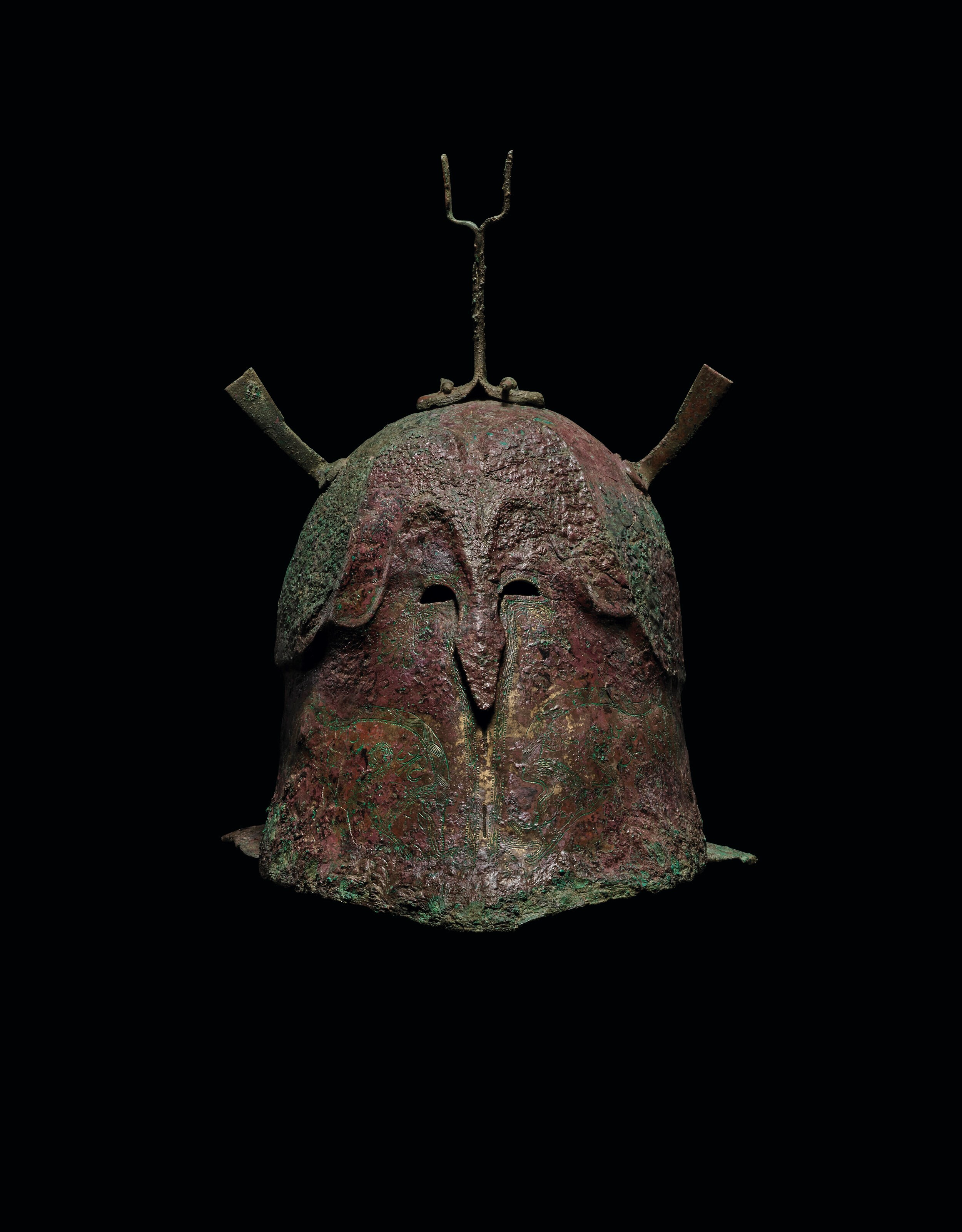 A GREEK BRONZE PSEUDO-CORINTHIAN HELMET