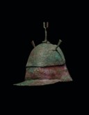 A GREEK BRONZE PSEUDO-CORINTHIAN HELMET