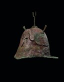 A GREEK BRONZE PSEUDO-CORINTHIAN HELMET