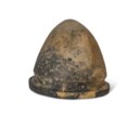 AN ETRUSCAN BRONZE HELMET OF NEGAU TYPE