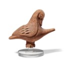 A GREEK POTTERY FIGURAL FEEDER FLASK