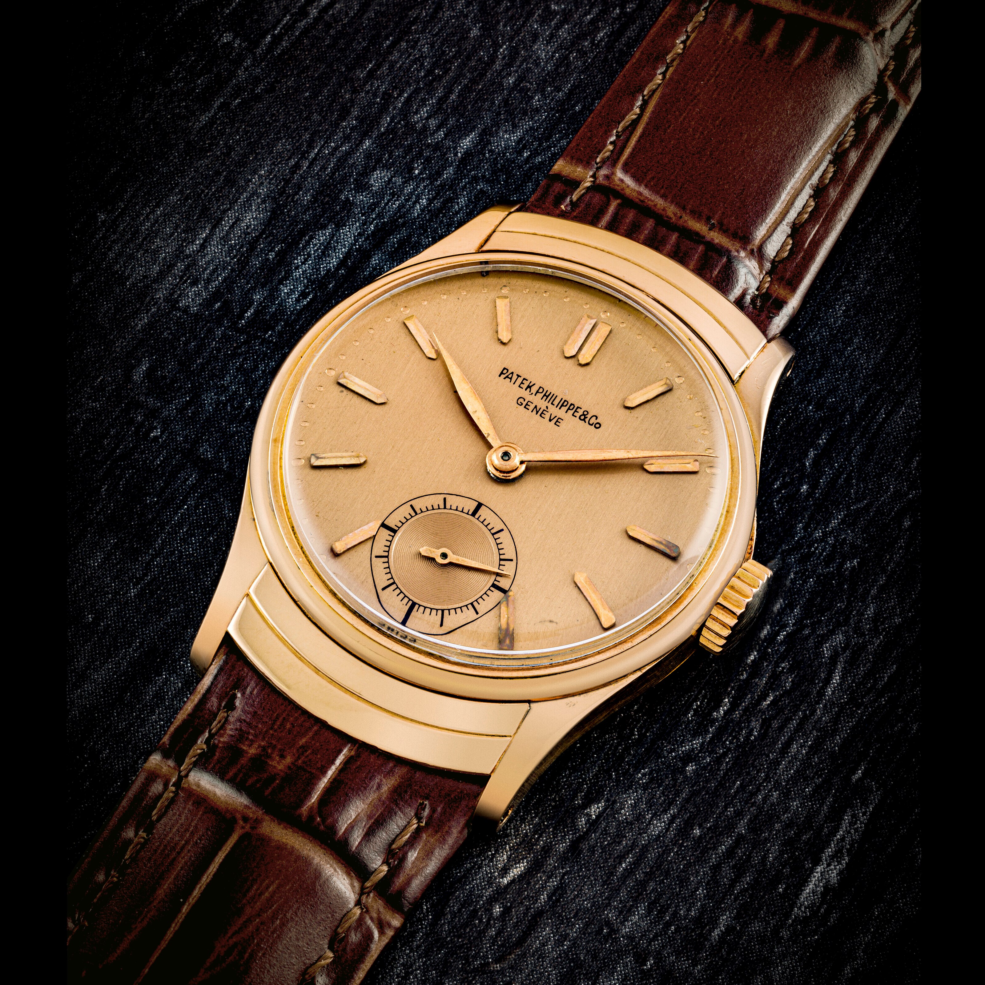 PATEK PHILIPPE. A SUPERB 18K PINK GOLD WRISTWATCH WITH PINK DIAL