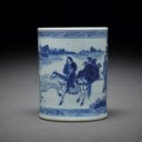 A BLUE AND WHITE BRUSH POT