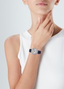 ROLEX. A VERY RARE AND HIGHLY ATTRACTIVE 18K WHITE GOLD, DIAMOND AND SAPPHIRE-SET AUTOMATIC CHRONOGRAPH WRISTWATCH WITH BAGUETTE-CUT SAPPHIRE BEZEL