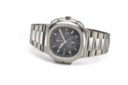 PATEK PHILIPPE, REF. 5990/1A-001, NAUTILUS, A STEEL DUAL-TIME FLYBACK CHRONOGRAPH BRACELET WATCH WITH DATE AND DAY/NIGHT INDICATORS