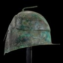 A GREEK BRONZE PSEUDO-CORINTHIAN HELMET