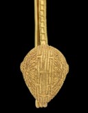 AN ETRUSCAN GOLD FIBULA