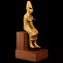 A CANAANITE BRONZE AND SHEET GOLD SEATED DEITY