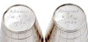 A SET OF FOUR GEORGE III SILVER DOUBLE STIRRUP CUPS