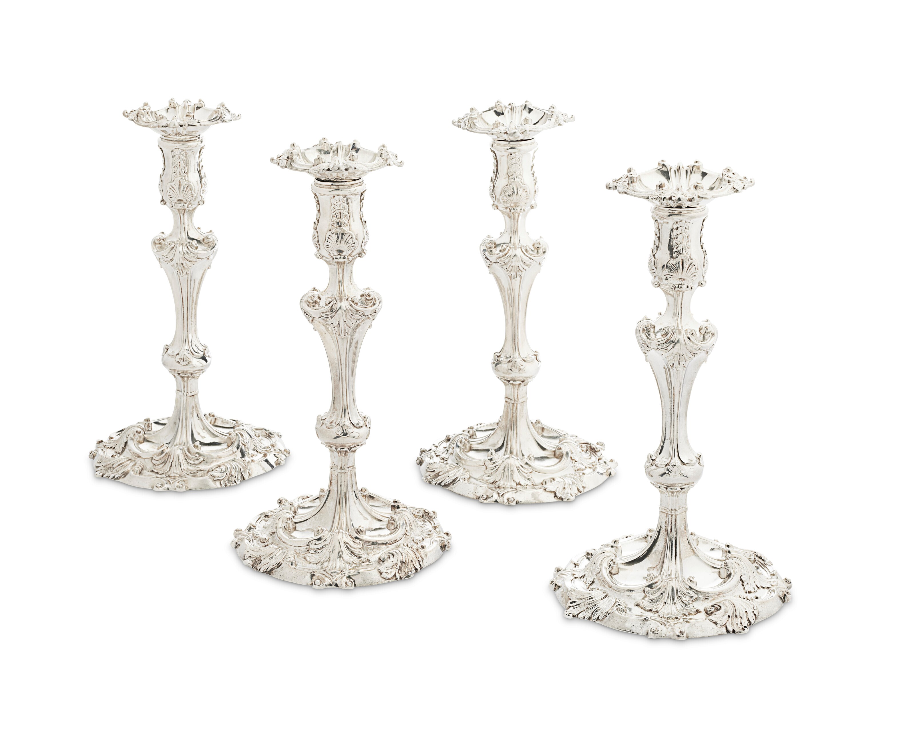 A SET OF FOUR GEORGE II SILVER CANDLESTICKS