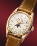 ROLEX. AN EXCEEDINGLY RARE AND OUTSTANDINGLY WELL PRESERVED 18K PINK GOLD AUTOMATIC TRIPLE CALENDAR WRISTWATCH WITH MOON PHASES AND STAR HOUR MARKERS