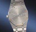 AUDEMARS PIGUET. A POSSIBLY UNIQUE AND HIGHLY ATTRACTIVE STAINLESS STEEL AUTOMATIC PERPETUAL CALENDAR WRISTWATCH WITH MOON PHASES, EMERALD GREEN DIAL AND BRACELET
