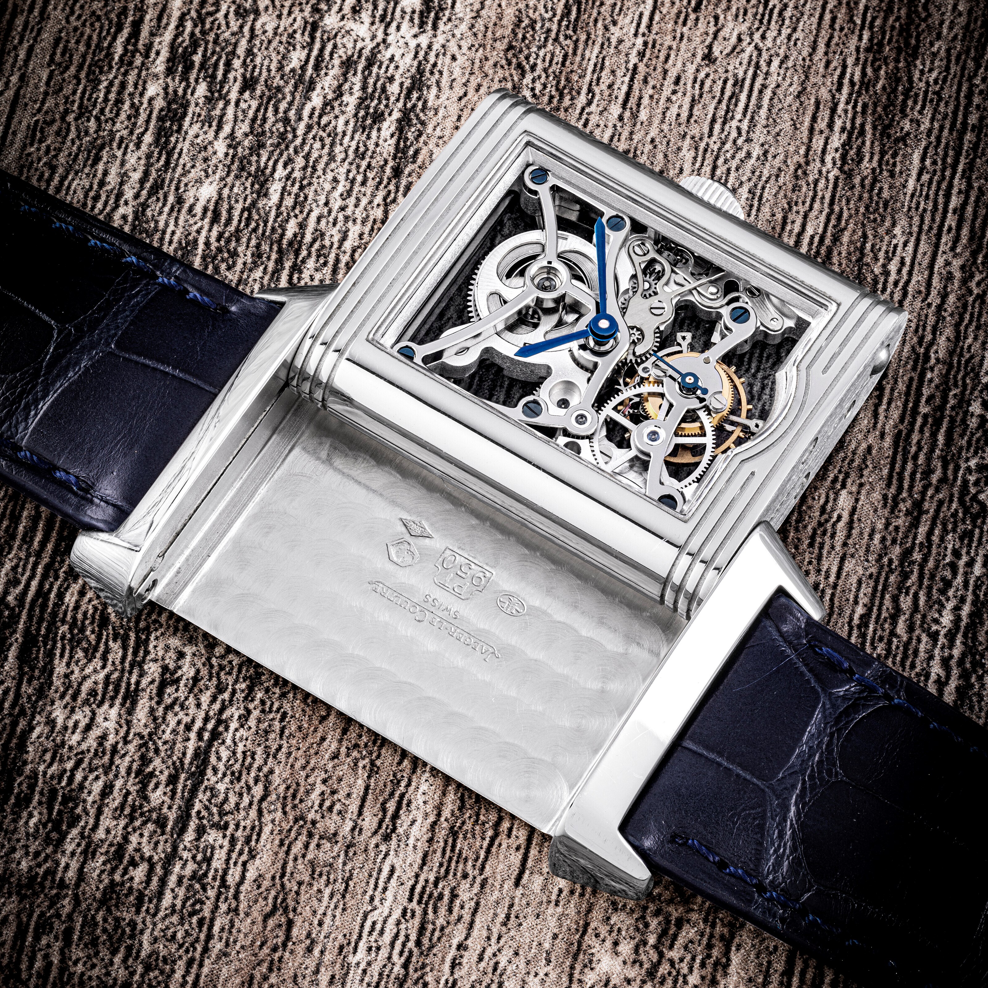 JAEGER-LECOULTRE. A RARE PLATINUM LIMITED EDITION REVERSIBLE SKELETONISED TOURBILLON WRISTWATCH