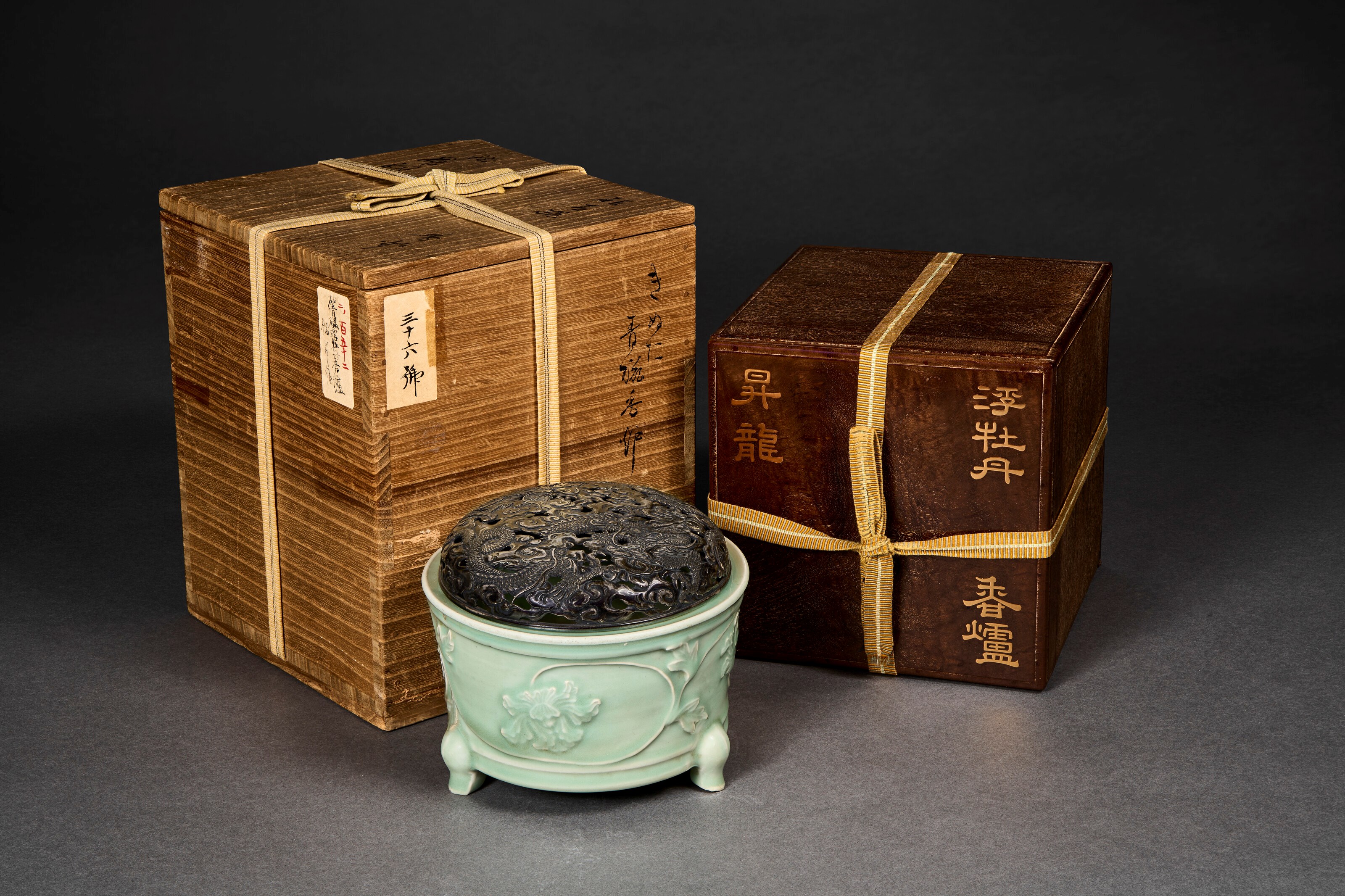 A RARE MOLDED AND CARVED LONGQUAN CELADON CENSER
