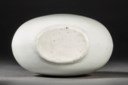 A VERY RARE SMALL INCISED WHITE-GLAZED 'LOTUS SCROLL' MOON FLASK