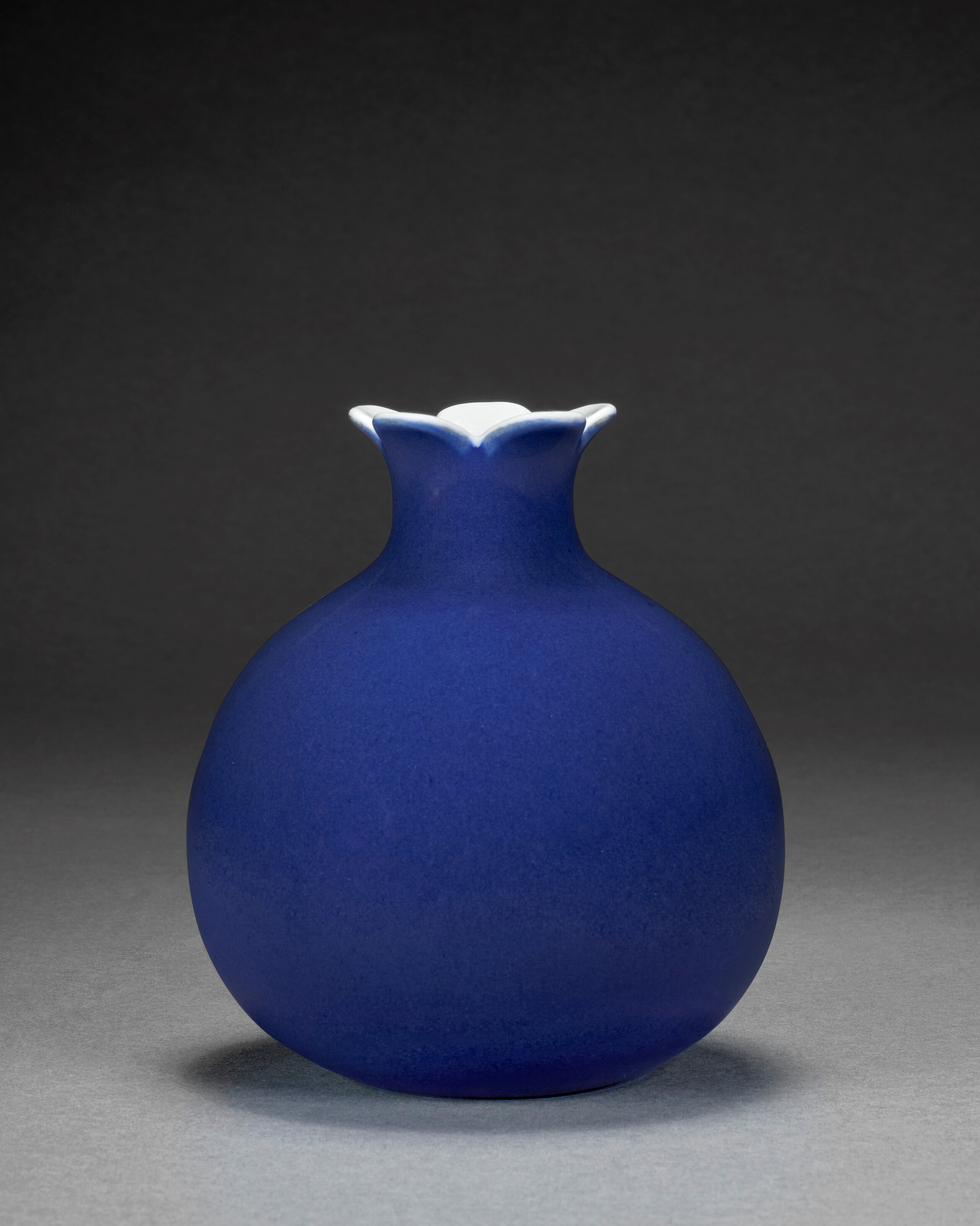 A VERY RARE BLUE-GLAZED POMEGRANATE-FORM VASE