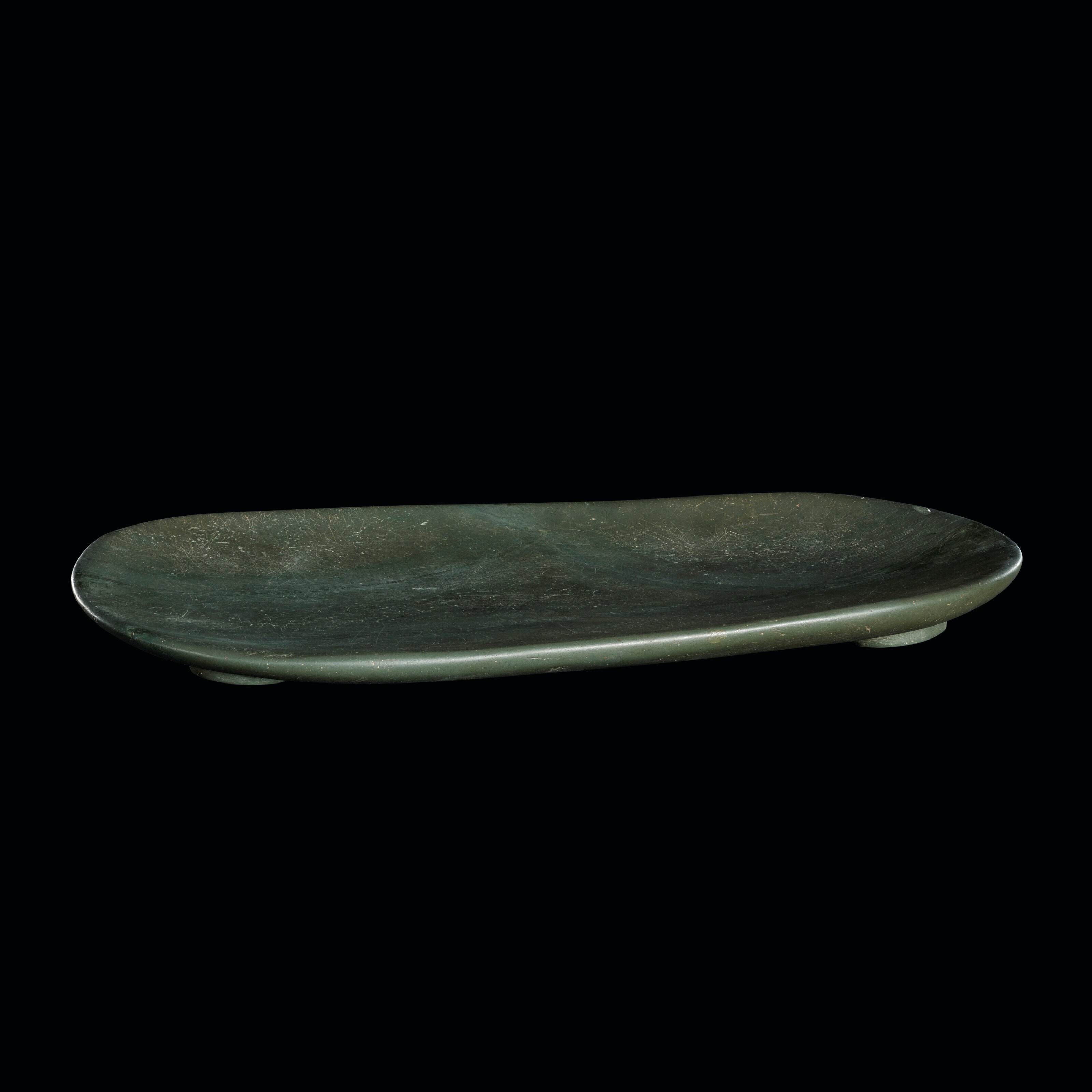 A LARGE EGYPTIAN SCHIST OFFERING DISH