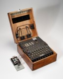 A FOUR-ROTOR ENIGMA CIPHER MACHINE