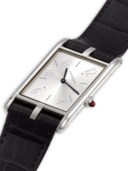CARTIER. A RARE AND UNUSUAL PLATINUM LIMITED EDITION ASYMMETRICAL WRISTWATCH