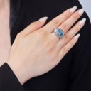 A SUPERB COLOURED DIAMOND AND DIAMOND RING, BY CARTIER