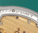 F.P. JOURNE. A VERY RARE AND ELEGANT PLATINUM LIMITED EDITION TONNEAU-SHAPED WANDERING HOURS WRISTWATCH