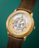 AUDEMARS PIGUET. AN ATTRACTIVE AND UNUSUAL 18K GOLD AUTOMATIC WANDERING HOUR WRISTWATCH