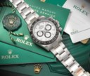 ROLEX. A COVETED AND SPORTY STAINLESS STEEL AUTOMATIC CHRONOGRAPH WRISTWATCH WITH BRACELET