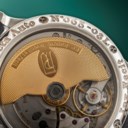 F.P. JOURNE. A VERY RARE, EARLY AND ATTRACTIVE PLATINUM AUTOMATIC WRISTWATCH WITH BRASS MOVEMENT, MOON PHASES, DATE AND POWER RESERVE