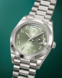 ROLEX. AN EXTREMELY RARE AND HEAVY PLATINUM AUTOMATIC WRISTWATCH WITH SWEEP CENTRE SECONDS, ARABIC CALENDAR, EASTERN ARABIC NUMERALS AND BRACELET