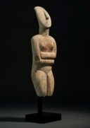 A LARGE CYCLADIC MARBLE FEMALE FIGURE