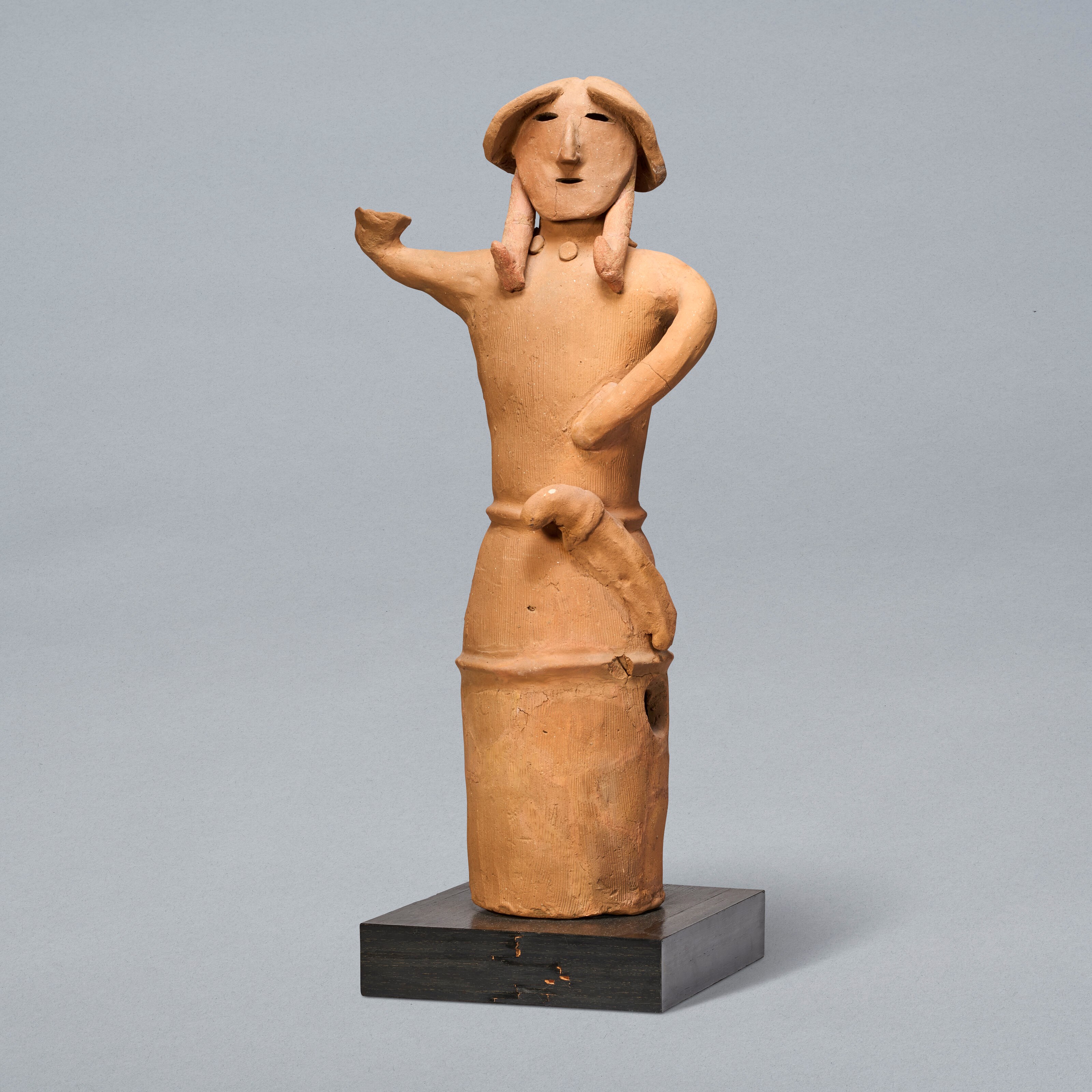 A HANIWA EARTHENWARE SCULPTURE OF A WARRIOR